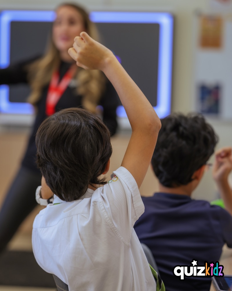 Two children taking part in a QuizKidz session